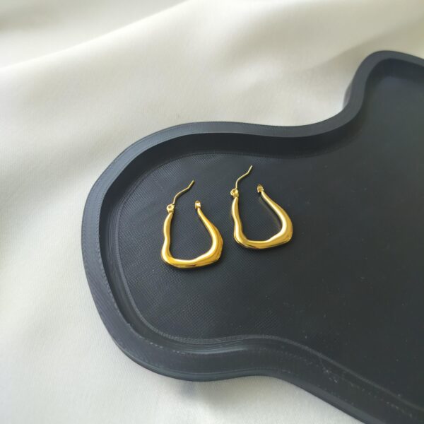 Opened View of Gold modern wavy hoop earrings | Nitara Haute
