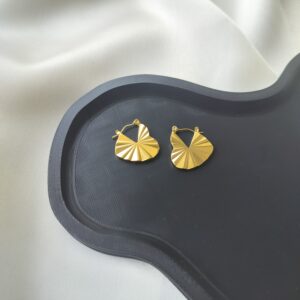 Gold heart-shaped hoop earrings with sunburst texture – Nitara Haute
