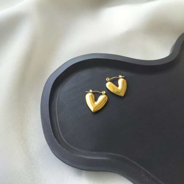Tiny solid gold heart hoop earrings for delicate styling | Nitara Haute