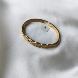 Close-Up of Twisted Cutwork Gold Bracelet