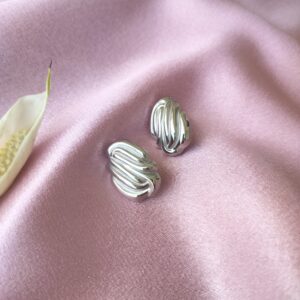 Chrome Drift Rhodium Studs – Front View with Vertical Wave Design