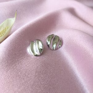 Front view of Luminous Sphere Silver Studs with vertical waves