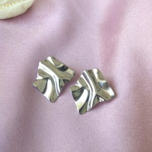 Close-Up of Luxe Flow Silver Studs’ Finish