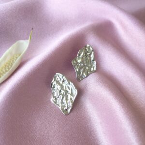 Molten Muse Rhodium Studs – Front View of Elegant Stud Earrings