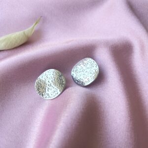 Front view of Radiant Wavy Circle Studs showing textured design