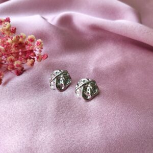 Silver Knot Gleam Studs – Front View of Elegant Knot Design