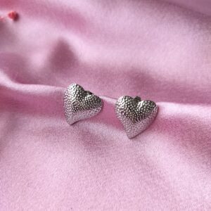 Silver dotted heart stud earrings front view
