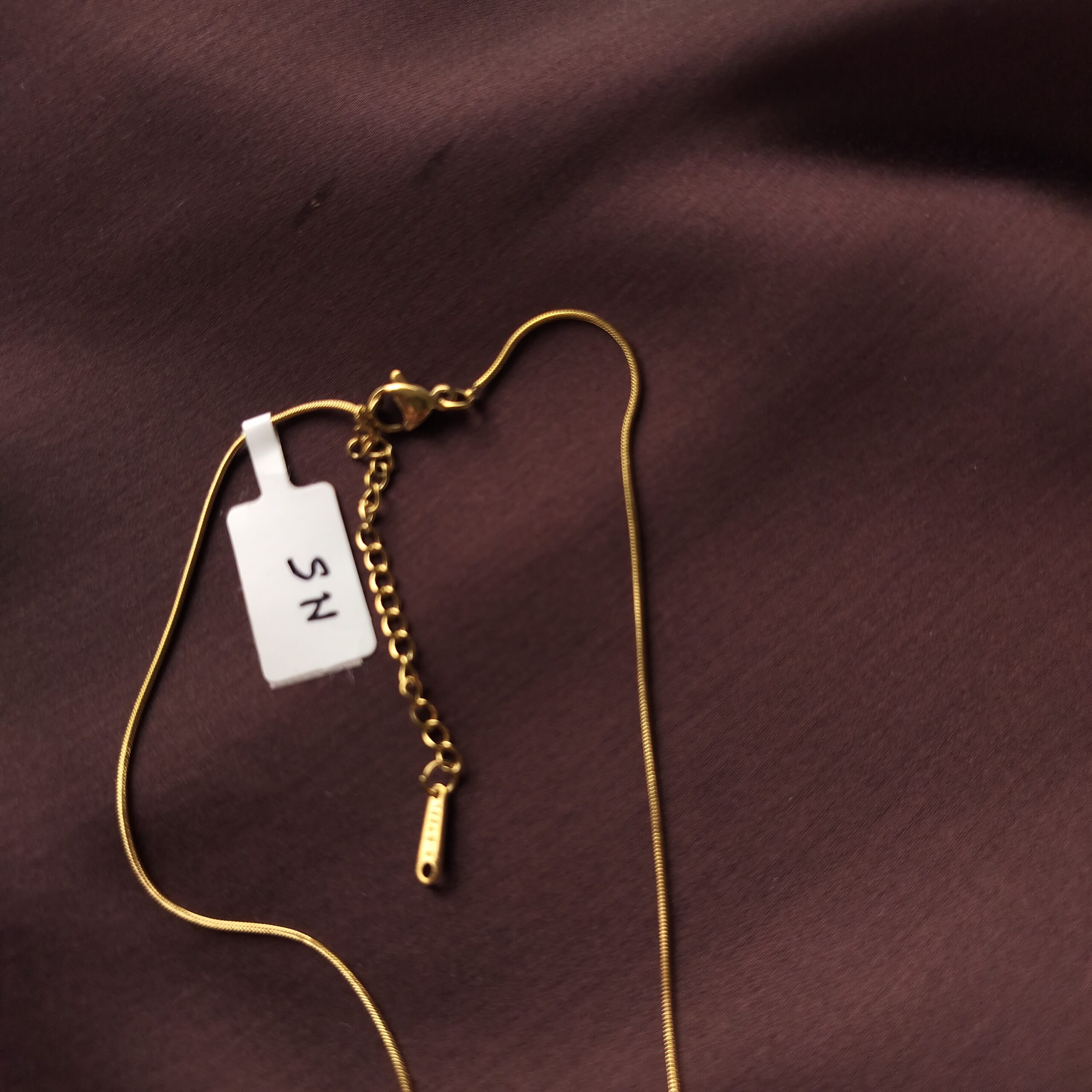 The adjustable Sunlit Spark pendant necklace