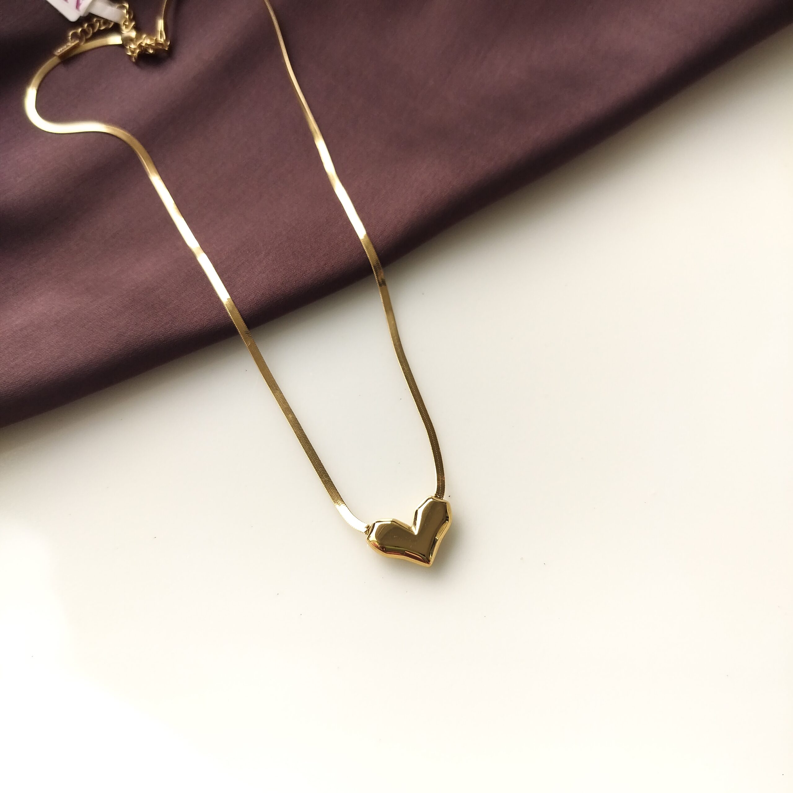 Back view of the gold plated heart pendant