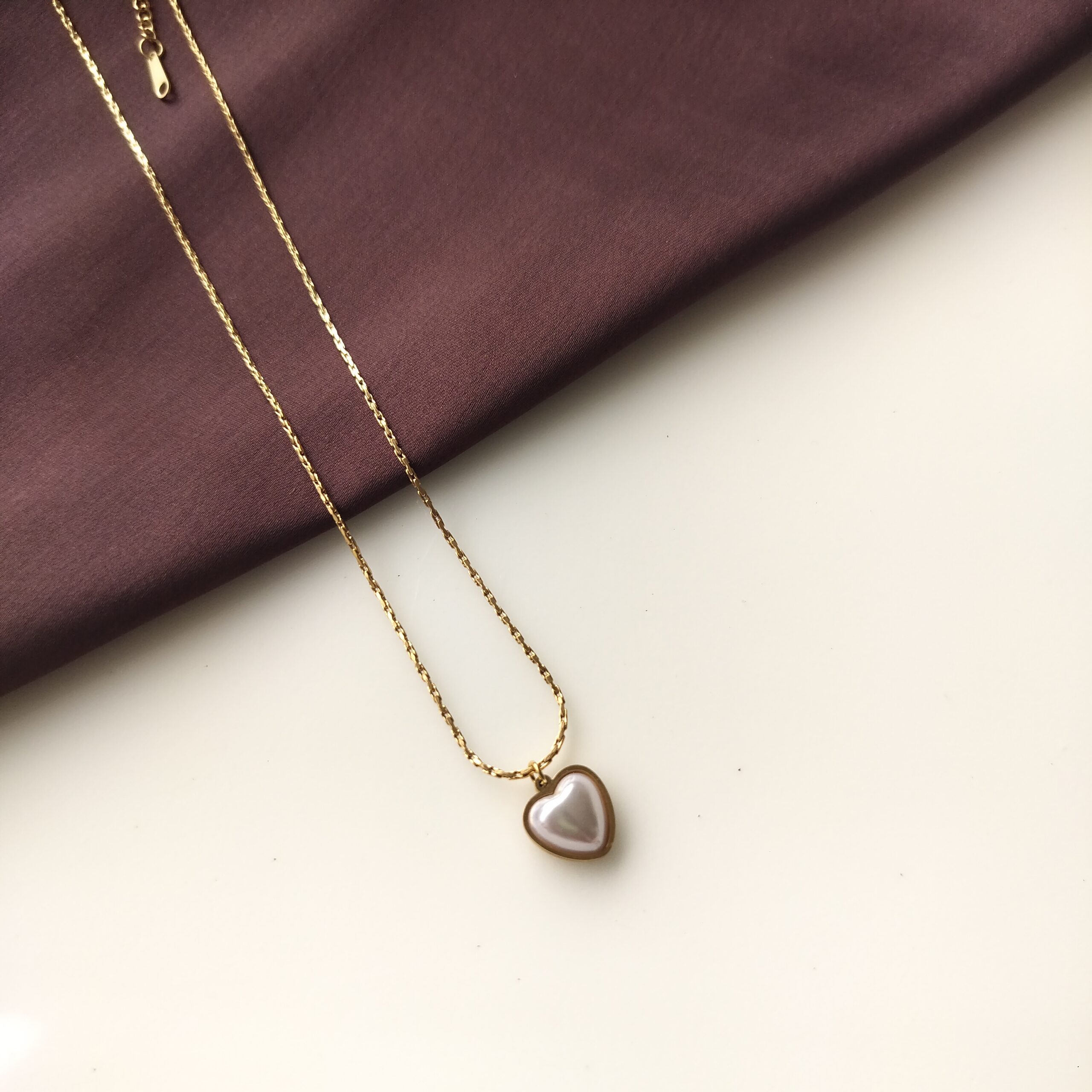 Celeste Heart Pendant Necklace with white pearl heart front view