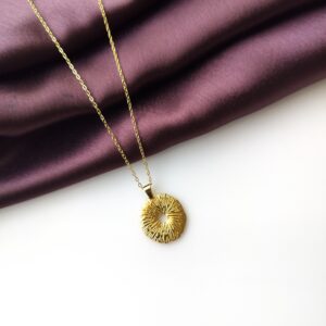 Celestia Gold Charm Chain with wide textured ring front view