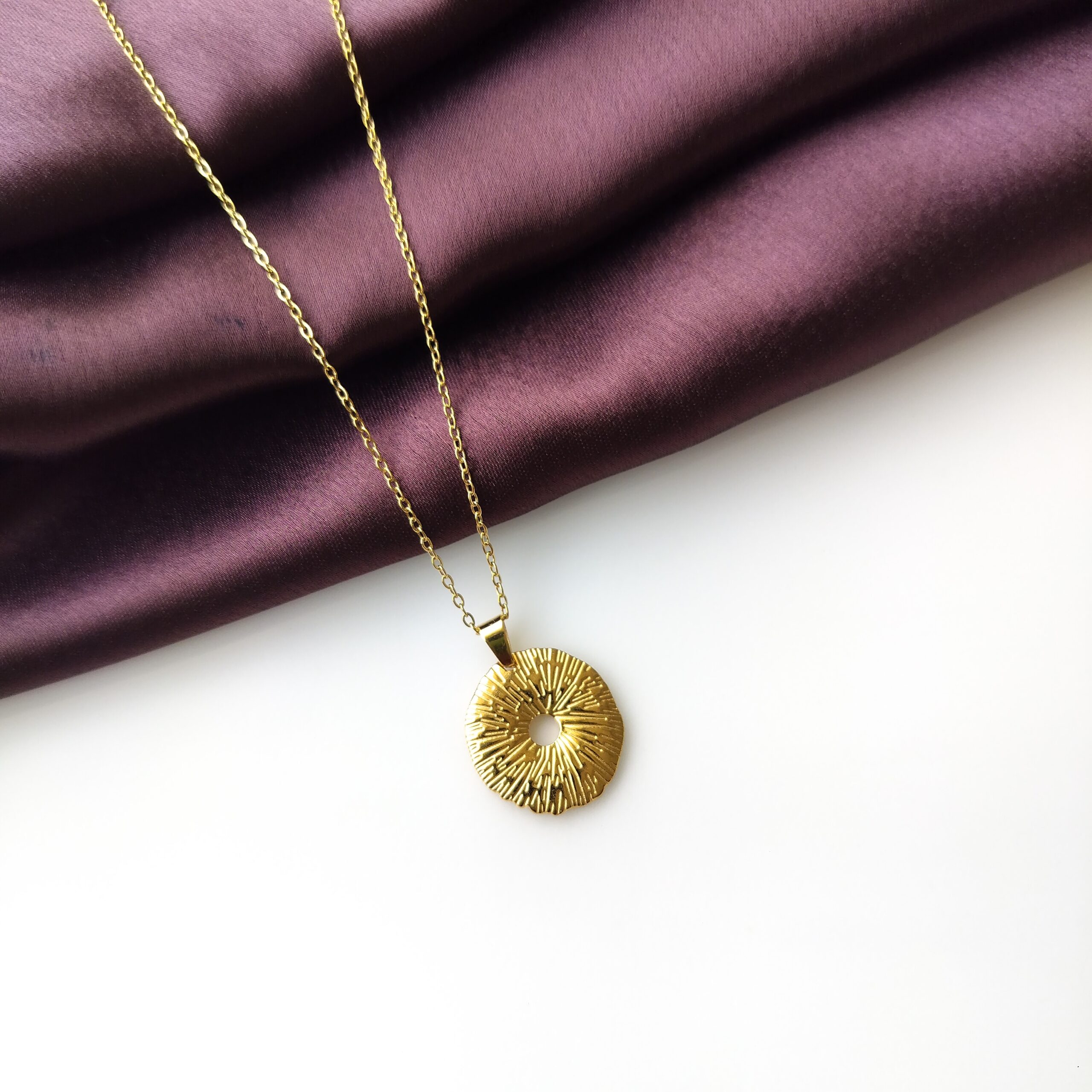 Celestia Gold Charm Chain with wide textured ring front view