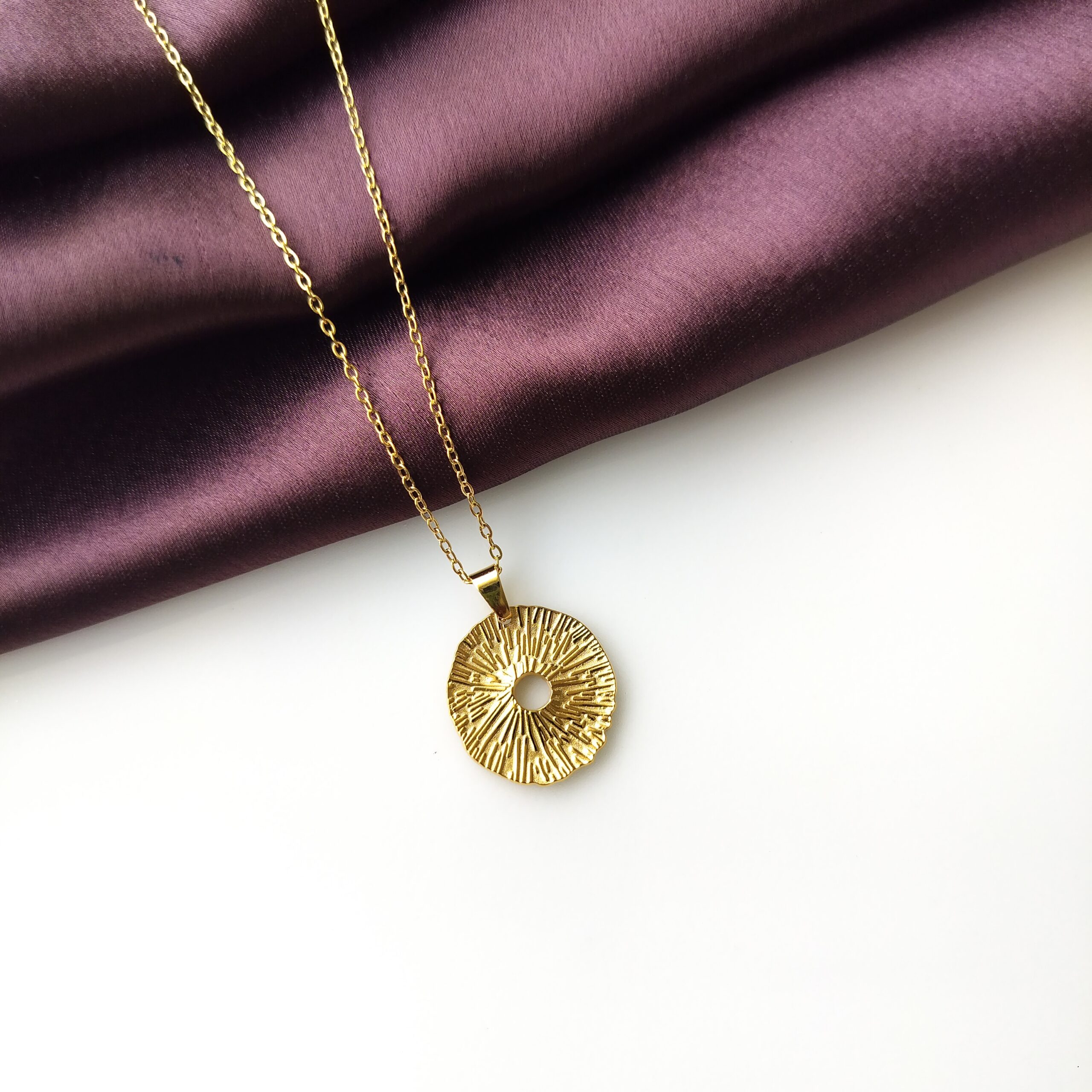 Back view of the wide textured ring pendant