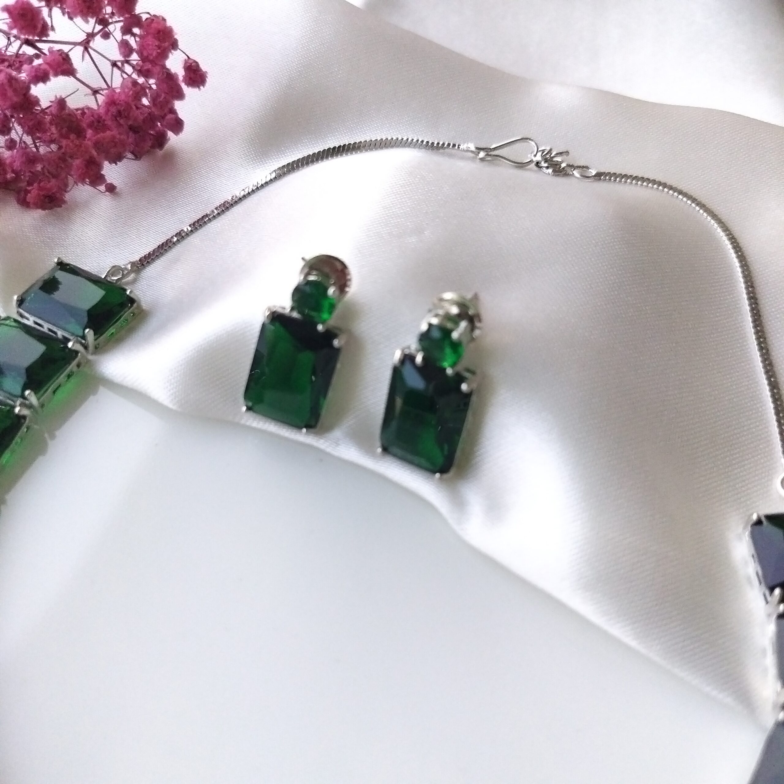 Delicate emerald green earrings from the choker set
