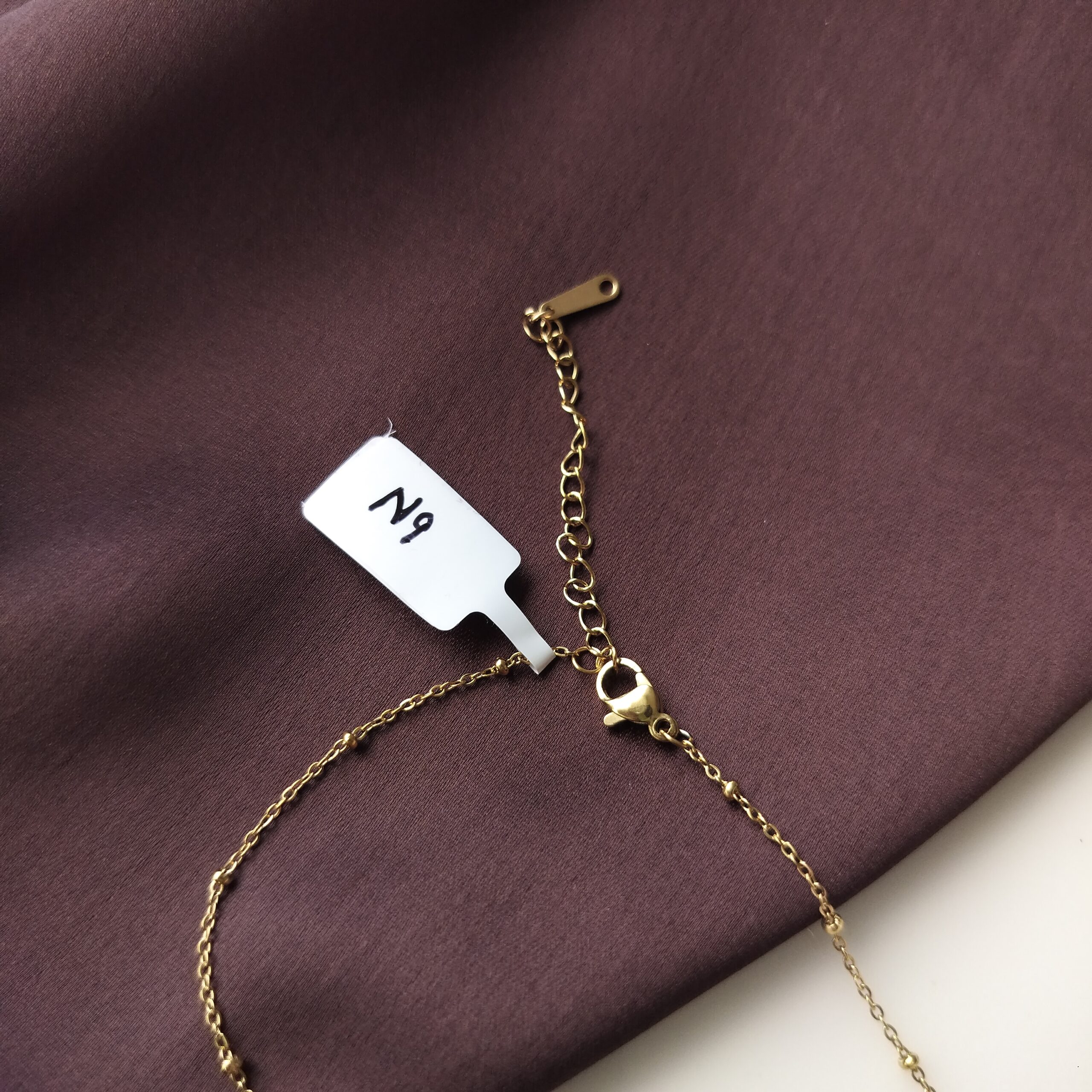 Back and side view of the floral charm chain links