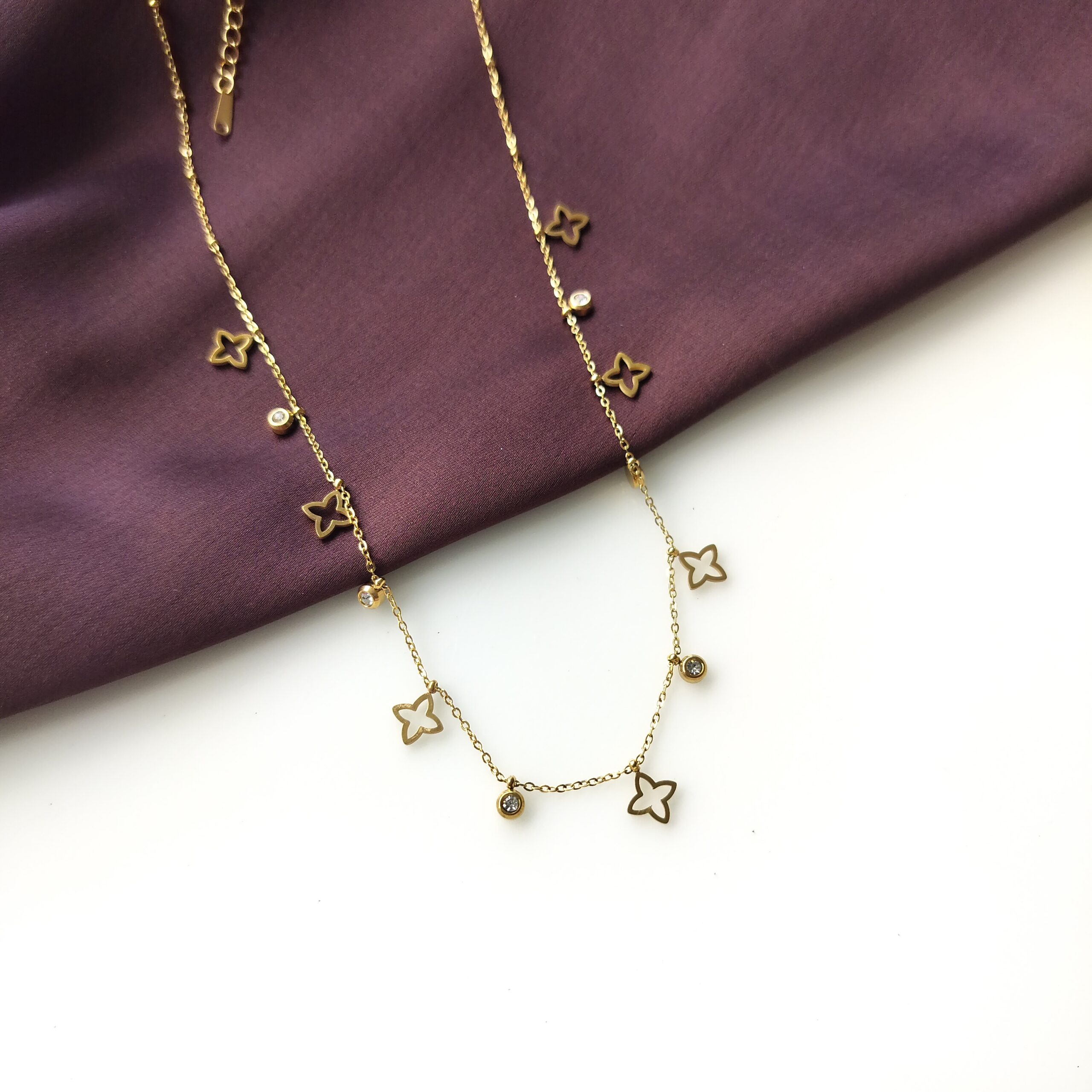 Golden Floret Charm Chain necklace with multiple floral charms