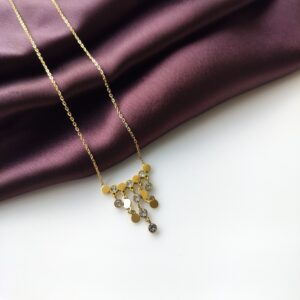 Golden Luxe Rainfall Necklace front view showing the cascading pendant strings.