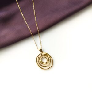 Golden Spiral Pendant Necklace front view showing the 2.5x2.5 cm spiral design.