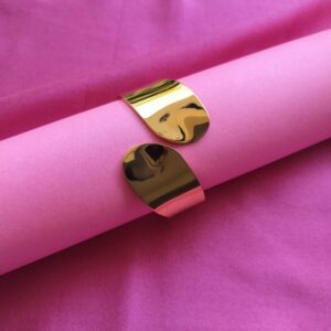 Extreme close-up of the gold plating and anti-tarnish finish on the cuff