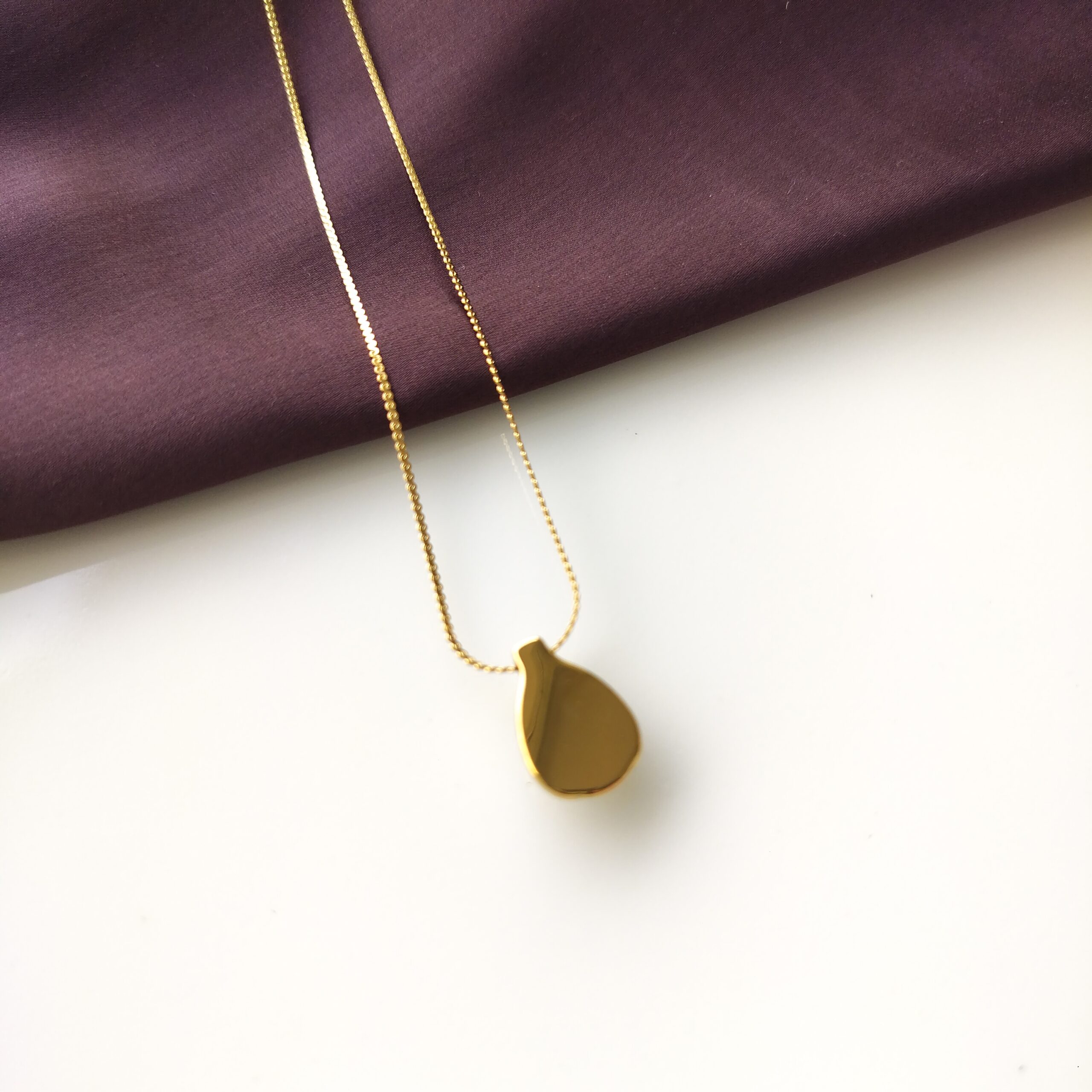 Back of the gold plated Moonlit Teardrop Pendant necklace.