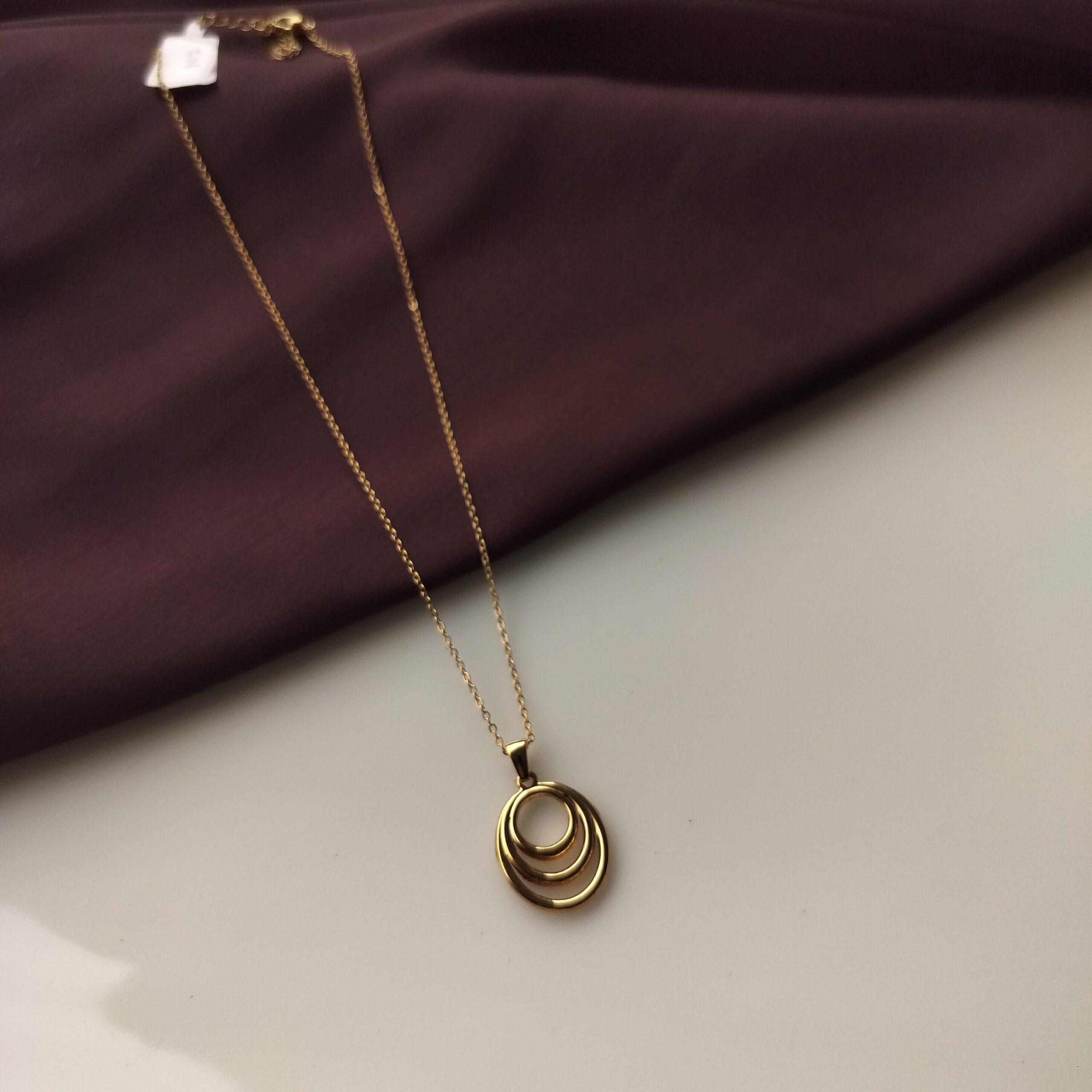 Radiant Loop Pendant Necklace with 3 oval rings front view